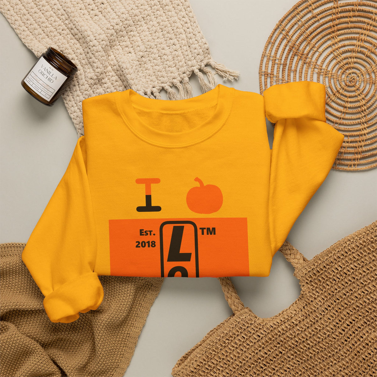 I pumpkin LongD Tag upright logo positive black on negative orange crewneck sweatshirt